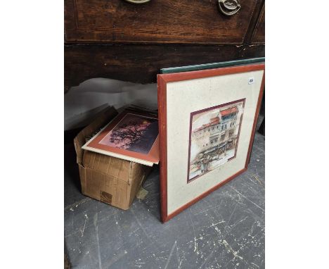 A box of prints and two mixed media pictures. 