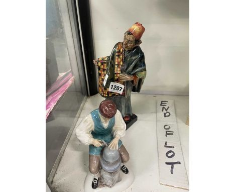 A Doulton figure 'The Carpet Seller' HN1464 and another '|The Silversmith of Williamsburg'