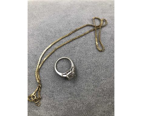 A 14ct white gold cz set dress ring and a 375 stamped gold chain, assessed as 9ct gold. 14ct weight 4.17 grams, 9ct weight 4.
