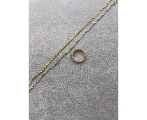 An antique 18ct gold wedding band ring, engraved 1889, together with a gold necklace chain. Both are unhallmarked and assesse