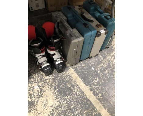 An electric lighting system, four cased drills, a pair of ski boots together with two Japanese wooden swords