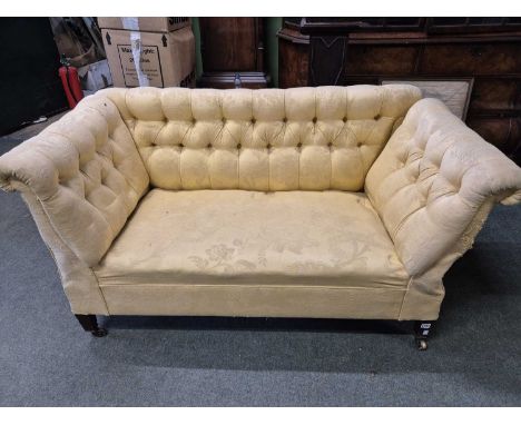 An Edwardian button back drop end small sofa. H 80cms W 150cms D 71cms  