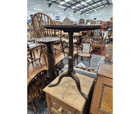 A Georgian oak tripod table.