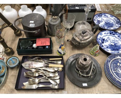 A silver ashtray, electroplate cutlery, a brass light unit, blue and white plates, four milk glass light shades, other glass 