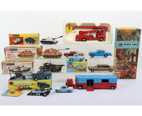 Quantity of Vintage Die Cast vehicles. Including Corgi Tanks, Fire Engine, Formula One car and more. (12 items) 