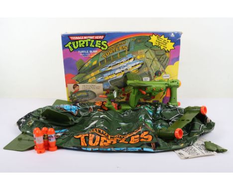 Vintage Teenage Mutant Hero Ninja Turtles Turtle Blimp Vehicle Boxed Bandai Playmates. Appears complete with Joke book and in
