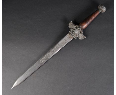 A 19th Century Spanish dagger with a Toledo blade. The dagger having a dome shaped pommel with floral motifs and a wooden gri