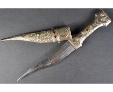 A mid 20th Century Syrian ceremonial ' Khanjar ' dress dagger. Flat pommel with a waisted grip, applied floral motifs and geo