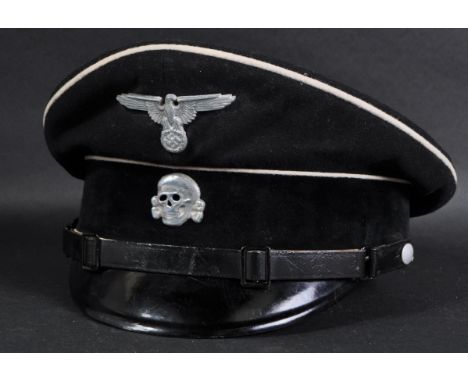 A believed original WWII Second World War Third Reich Nazi German SS Officers ( Allgemeine ) uniform peaked cap. Heavy black 