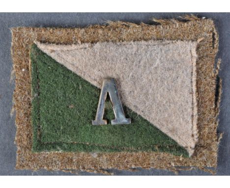 A WWI First World War Australian Veteran Officers Anzac / Gallipoli shoulder flash patch. A brass letter ' A ' stitched to a 