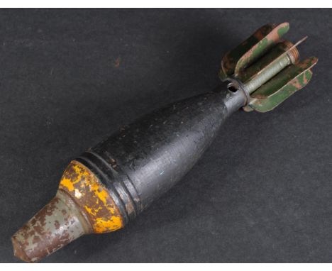 A vintage circa 1960s US United States Army 50mm training mortar round. Screw-on cap, hollow body and fin shaped tail. Measur