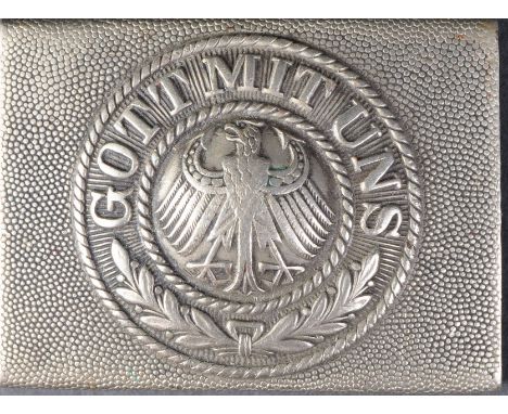 An original German / Weimer Republic Army Interwar period uniform belt buckle. Central Imperial Eagle
surrounded by a border 