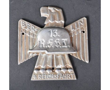 A pre WWII Second World War Third Reich Nazi German 13 R.F.S.I ' Reich Ride ' badge. Hollow backed metal badge in a silver fi