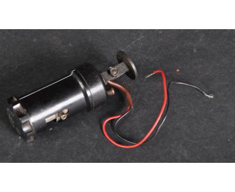 An original WWII Second World War RAF Royal Air Force Spitfire cockpit lamp. The cylindrical lamp with Bakelite body surround