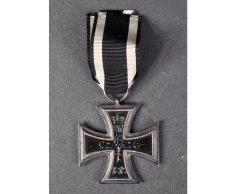 An original WWI First World War Imperial German / Prussian Army Iron Cross medal. A 2nd Class example suspended on original r