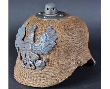 A WWI First World War Imperial German Army / Prussian pickelhaube uniform helmet. Thick leather construction with a hessian c