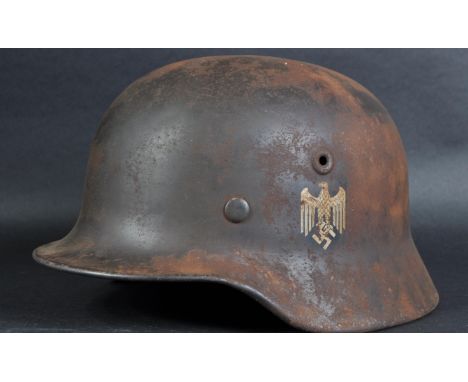 An original WWII Second World War Third Reich Nazi German M40&nbsp;Stahlhelm steel combat helmet. A double decal example with