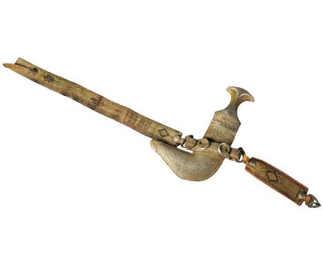A 20th Century Middle Eastern / Omani Khanjar / Jambiya dagger. Dome shaped pommel with a Rhino horn waisted grip and a curve