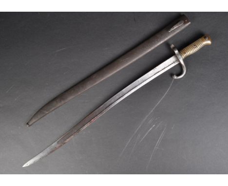 A 19th Century French 1866 pattern ' Chassepot ' rifle bayonet. The bayonet having ribbed brass hilt, muzzle ring and forward