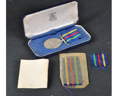 An original vintage British Civil Defence Long Service Medal. The oval medal depicting&nbsp;crowned head of Queen Elizabeth I