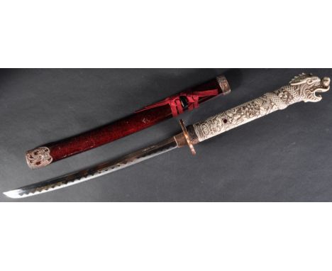 A 20th Century Japanese style Katana / Samurai sword. The celluloid hilt with a pommel in the form of a mythical dragon head 