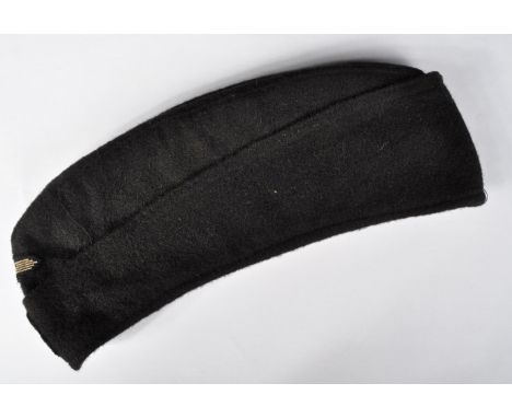 A WWII Second World War Third Reich Nazi German SS Panzer Officers side cap.&nbsp;The cap with embroidered eagle and Swastika