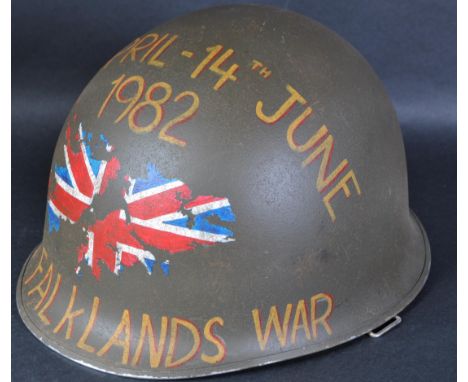 An original Falkland War era 1982 dated Argentine steel combat helmet souvenir. The helmet dedicated to the 2nd Battalion Par