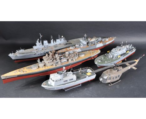 A collection of assorted scratch built hand made model warships comprising; Queen Elizabeth Class HMS Warspite, King George V