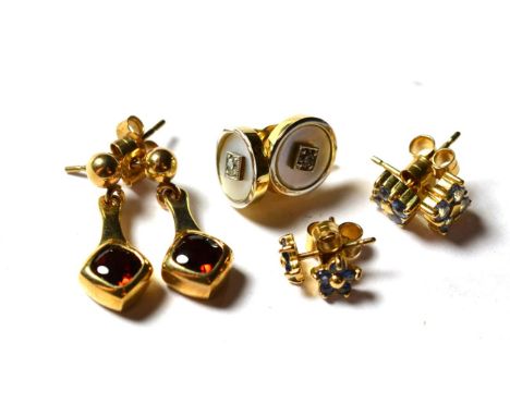 Two pairs of 9 carat gold sapphire cluster stud earrings; a pair of mother-of-pearl and diamond stud earrings, stamped '9CT';