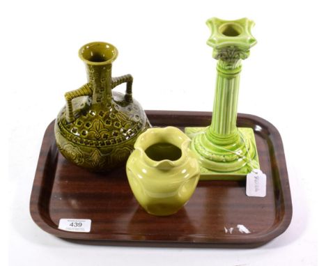 A Burmantofts Faience pottery candlestick, lime glaze, impressed factory mark and 1198, 21cm; a Burmantofts Faience pottery t