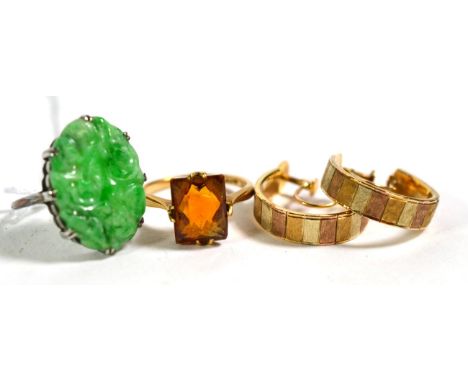 A jade ring, stamped '18CT', finger size K1/2; a gem set ring, stamped '9CT', finger size L1/2; and a pair of three colour ea
