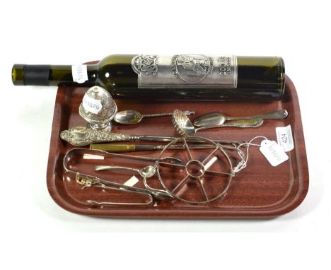 A mixed lot of silver and silver-plate, comprising: a silver-plated apple corer and divider, by Asprey; a silver-plated finia