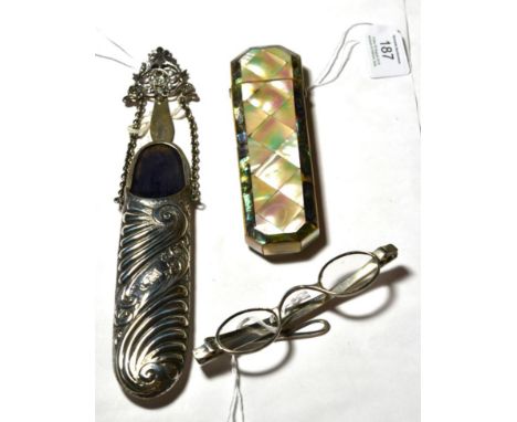 A pair of George IV silver spectacles, by Joseph Willmore, Birmingham, 1821, with oval lenses and hinged arms; an associated 