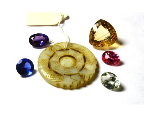 Five loose stones comprising of pink topaz, green quartz, blue glass, purple synthetic sapphire, citrine; and a jade disc