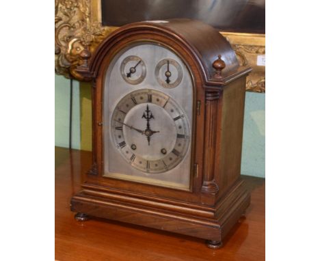 A mahogany quarter striking mantel clock, movement backplate stamped W &amp; H Sch