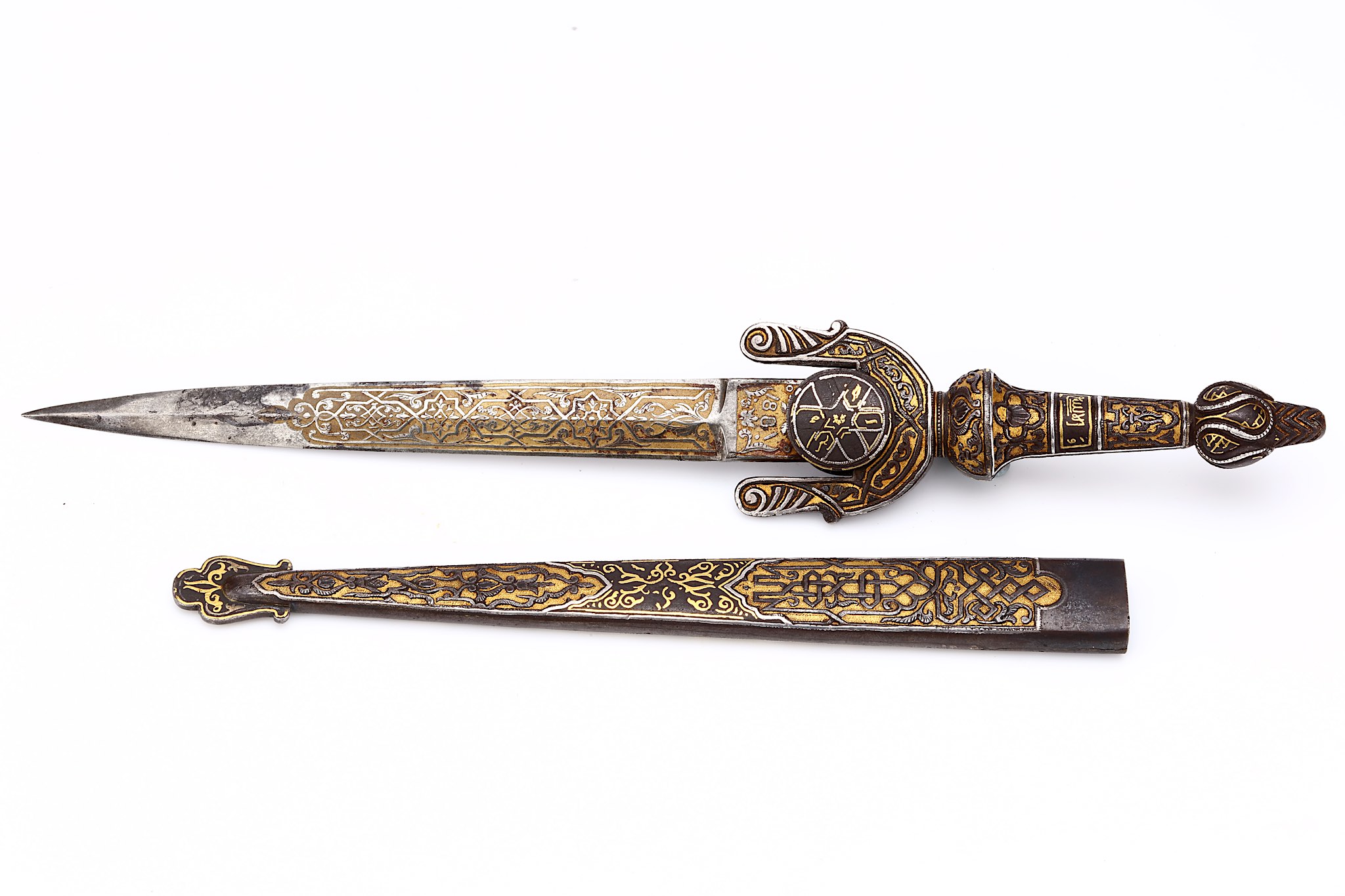 A FINE SPANISH TOLEDO DAGGER, with gold inlaid and detailed etched ...