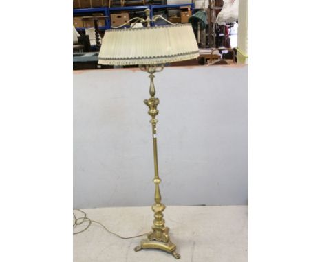 Early 20th century Heavy Brass Four Branch Standard Lamp on Column Support and Platform Base with Three Lion Paw Feet, with s
