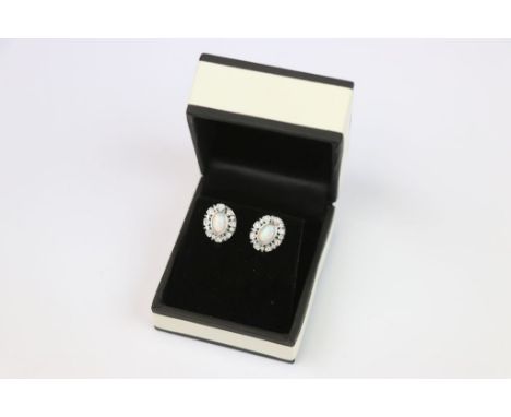 Pair of Silver CZ and Opal stud earrings 