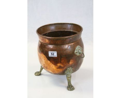 Vintage Copper Cylindrical Planter with Brass Lion Mask Handles and raised on Three Brass Lion Paw Legs, 25cms high