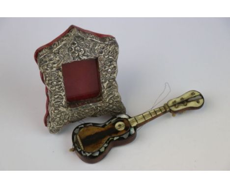 19th century Miniature Tortoiseshell and Bone Guitar together with a Small White Metal Framed Easel Back Photograph Frame