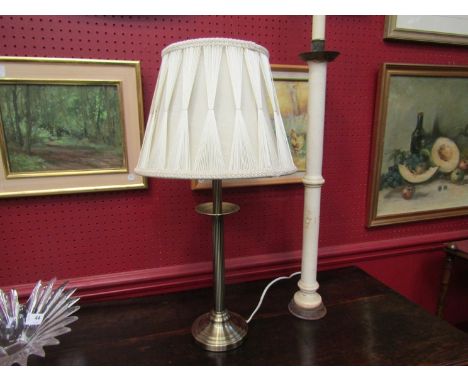 A brass effect table lamp with cream silk pinch pleated thread shade 