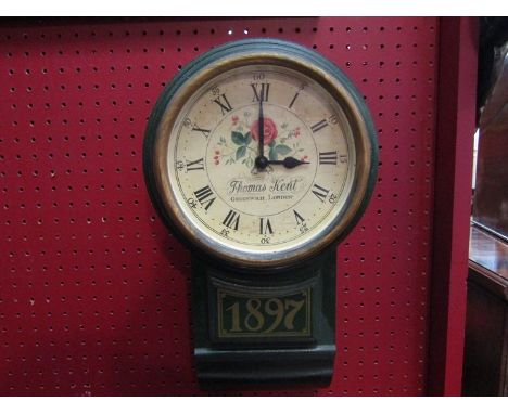A modern kitchen clock in the Victorian style, green case  