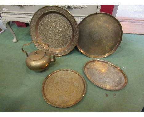 Four Indian brass trays and a teapot (5)  