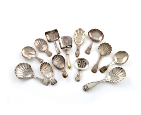 A collection of thirteen silver caddy spoons, various dates and makers, comprising: a Fiddle, Thread and Shell pattern one, b