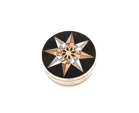 λA George III silver-mounted patch box, unmarked circa 1790, circular form, the tortoiseshell cover and base, the pull-of cov