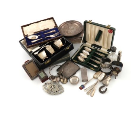 A mixed lot of silver items, various dates and makers, comprising: a cigarette box, a cased three-piece condiment set, a circ