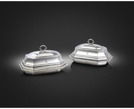 A pair of George III silver entrée dishes and covers, by Paul Storr, London 1799, rectangular form, canted corners, the domed