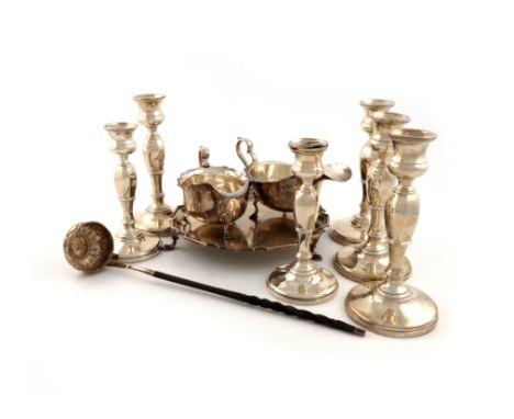 λA mixed lot of silver items, various dates and makers, comprising: a set of four candlesticks with a pair en suite, by Mappi