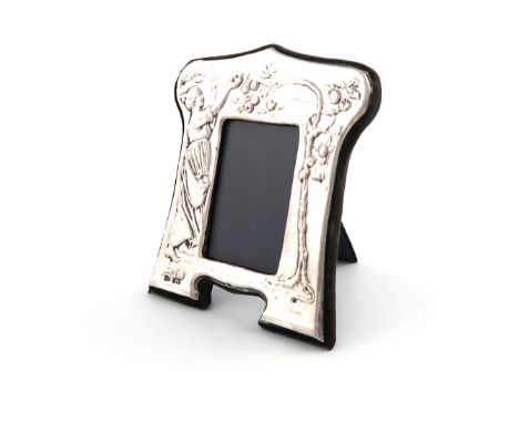 A modern silver photograph frame, by Keyford Frames Limited, Birmingham 1981, shaped upright rectangular form, embossed with 