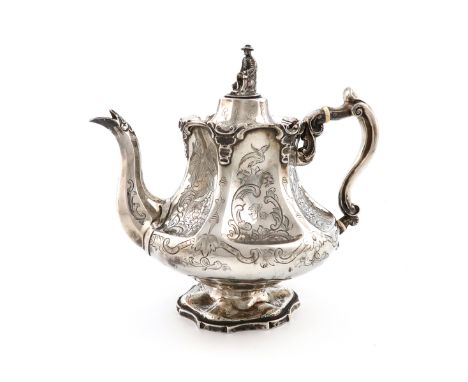 λA Victorian silver teapot, by William Hunter, London 1848, lobed baluster form, engraved decoration, scroll handle with ivor